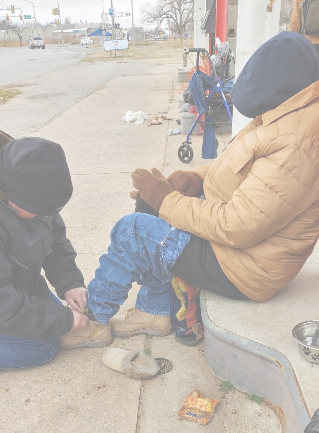 Triad Ministries proving shoes for homeless man